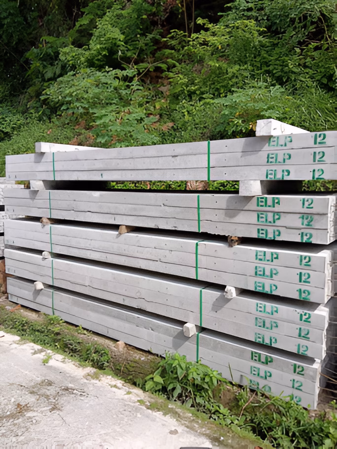 a number of 4×4-inch concrete posts stacking up